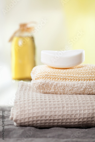 spa towels and aromatic massage oil