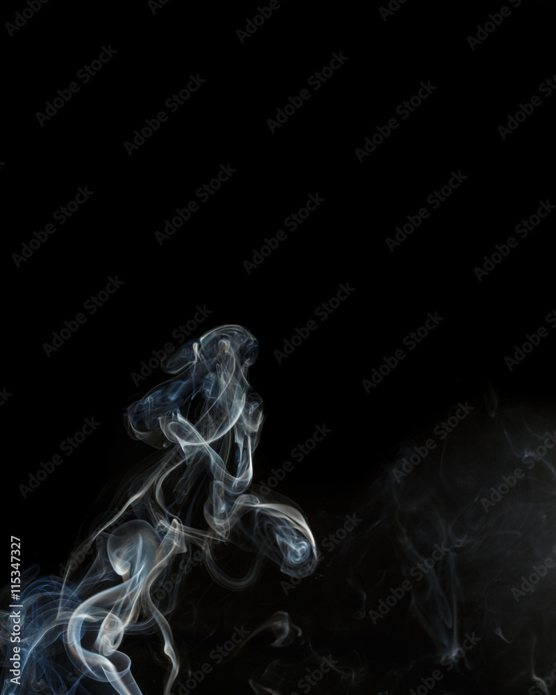 Fototapeta premium Abstract blue smoke from aromatic sticks.