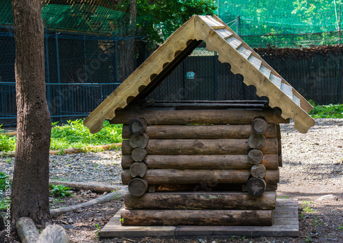 Vászonkép Small wooden house for animals in the aviary reserve