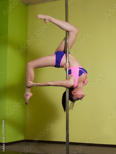 Woman's pole dancing flexibility