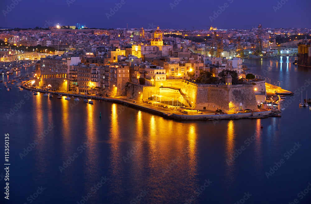 The night view of Senglea peninsula from Valletta, Malta