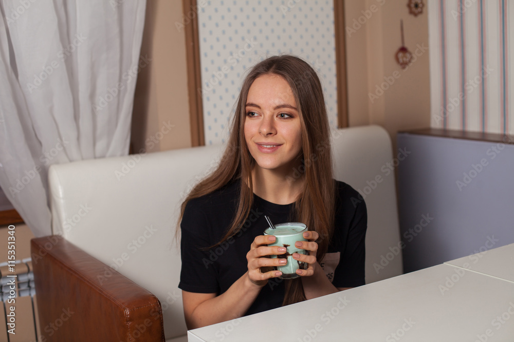 Young woman drinking coffee Young woman drinking coffee