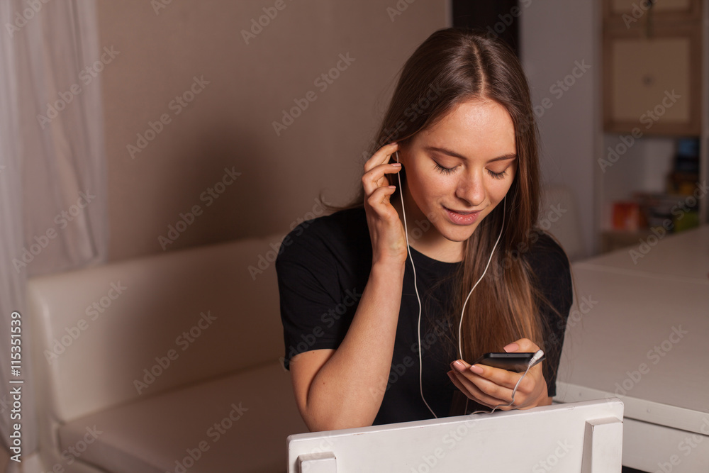 Fototapeta premium Woman listening music