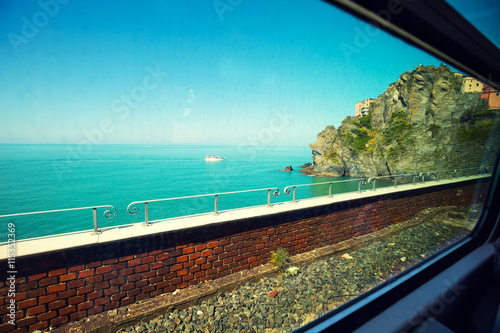 view at ligurian sea, from a window of running train. Cinque Terre, Italy