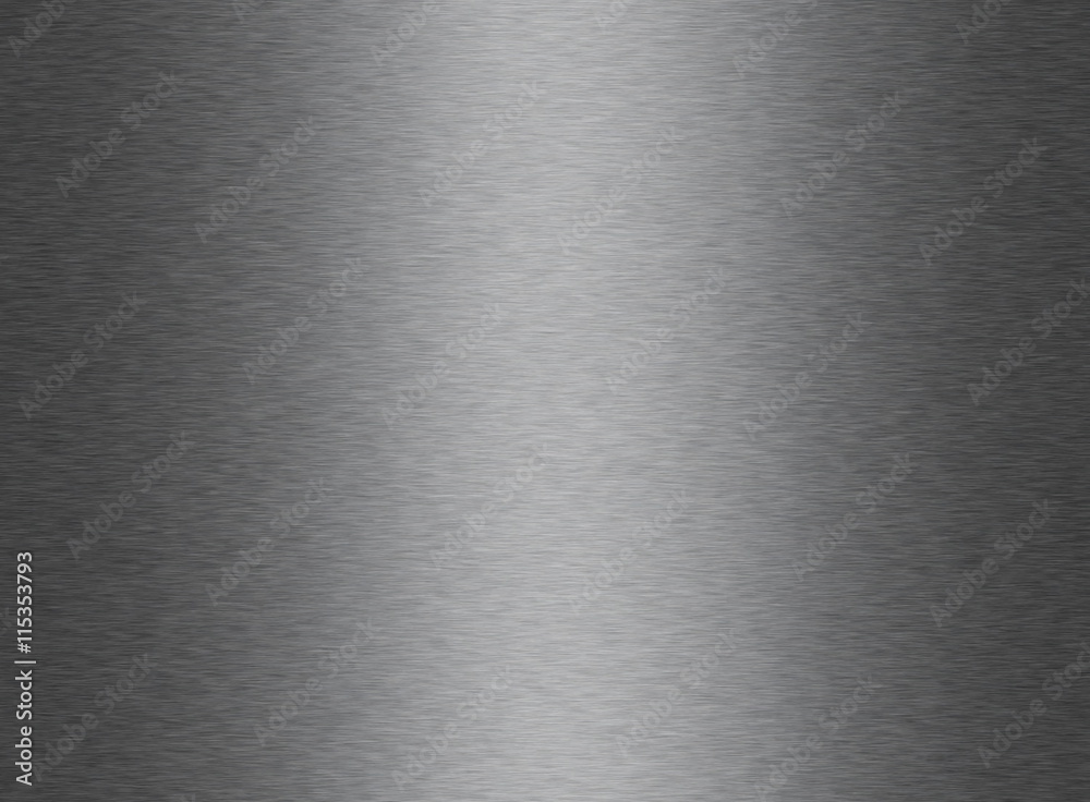 Grey shiny brushed metal sheet texture background with copy space for text. Grey shiny brushed metal sheet texture background with copy space for text.
