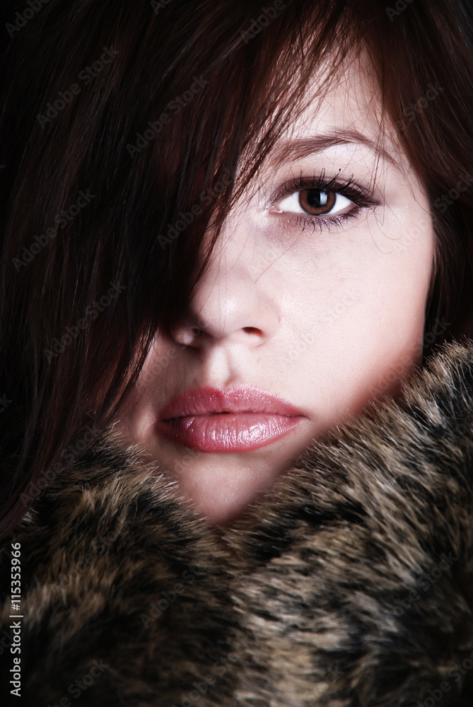Beauty Fashion Portrait of young woman with fur Beauty Fashion Portrait of young woman with fur