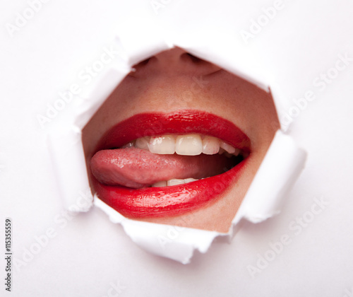 Foto Lips from paper hole