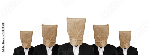 Obraz na plátně Five businessman in suit with brown paper bag on head