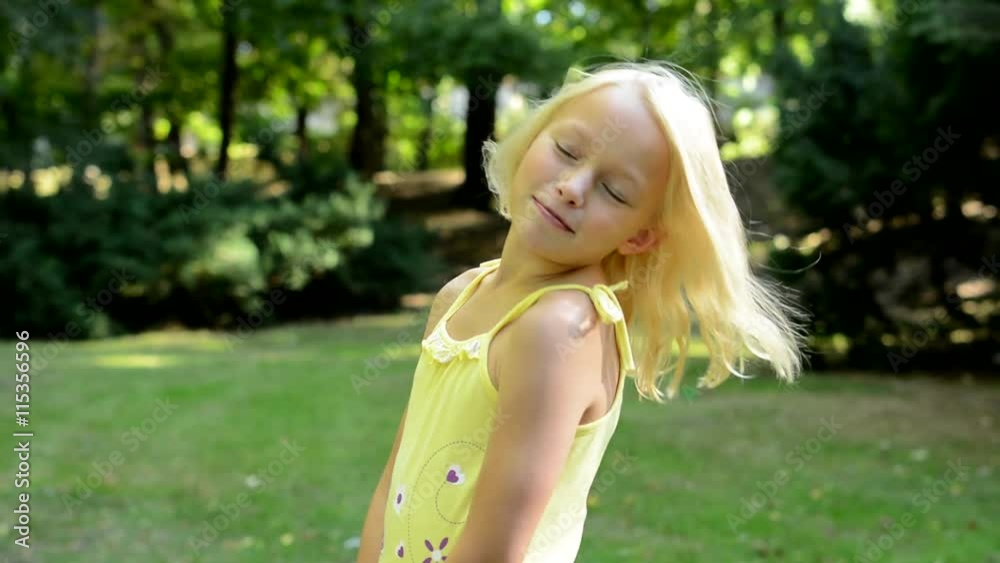 little cute girl in park - changing different face and body expressions - based hands little cute girl in park - changing different face and body expressions - based hands