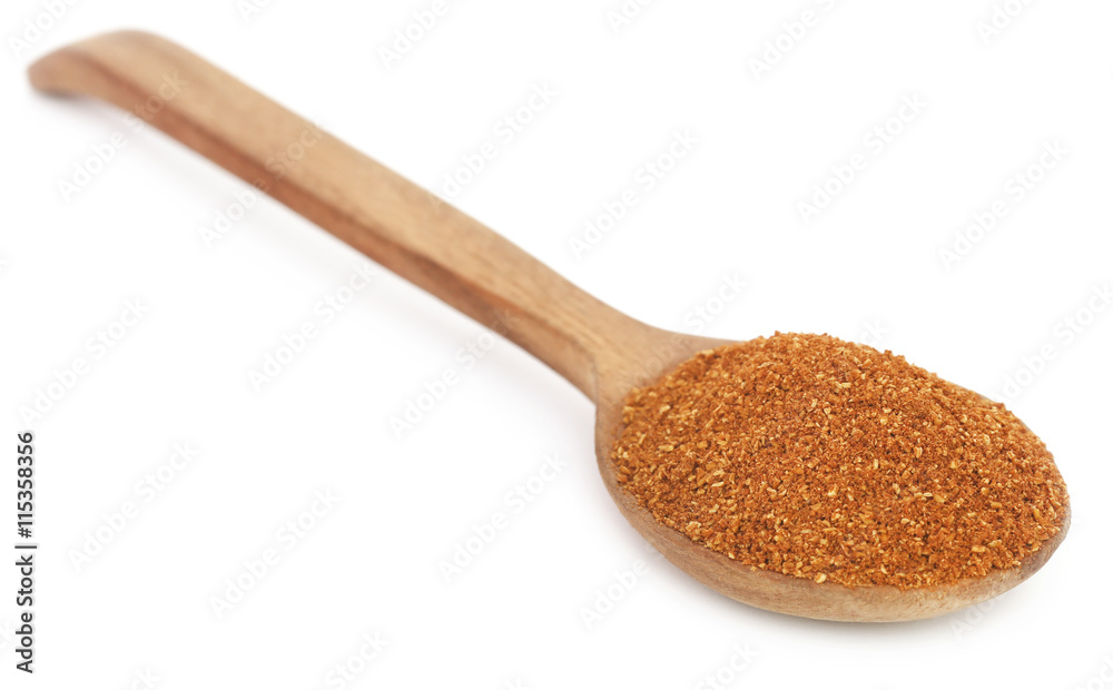 Crushed cumin in a wooden spoon Crushed cumin in a wooden spoon