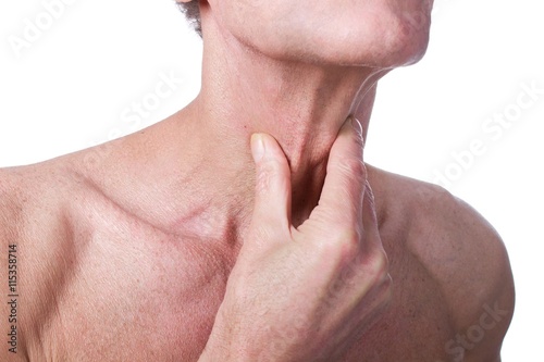 senior man with throat or neck irritation