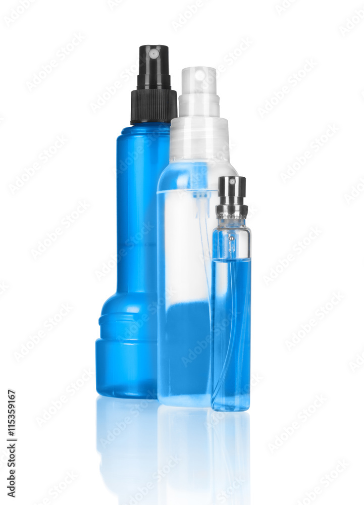 three spray  bottles on a white background