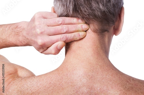 Man touching back of spine.Pain concept.Isolated on white