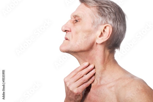 senior man with throat or neck irritation photo