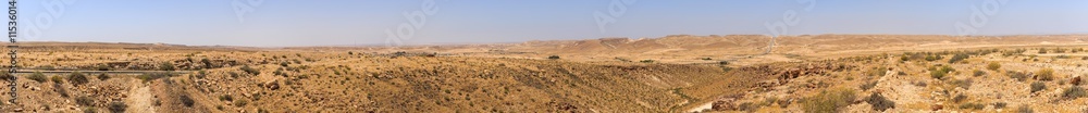 Panorama of mountains in Negev desert with road