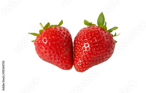 Two strawberries close up on white background