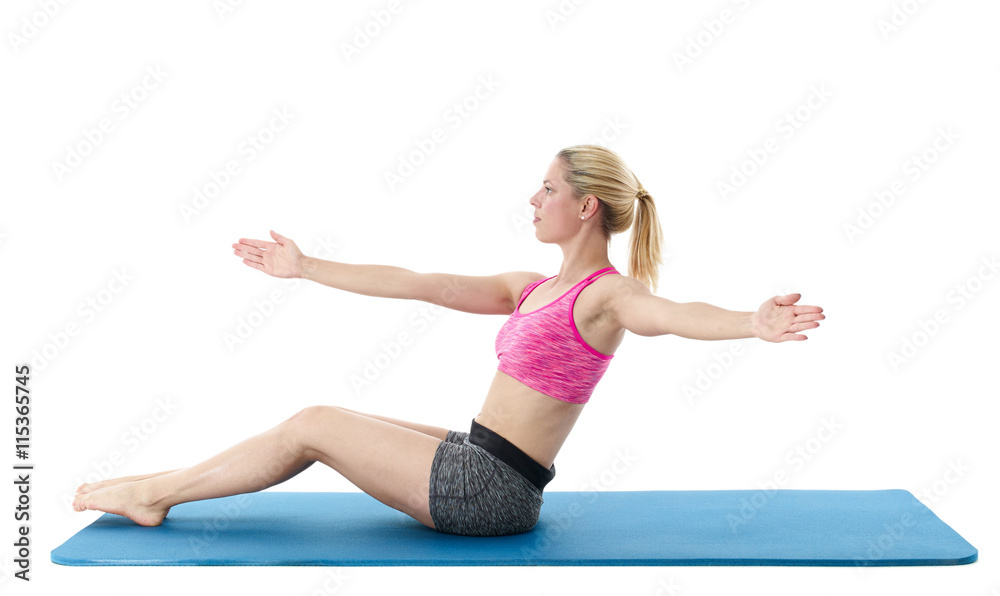Woman doing stretching exercises.. Woman doing stretching exercises..