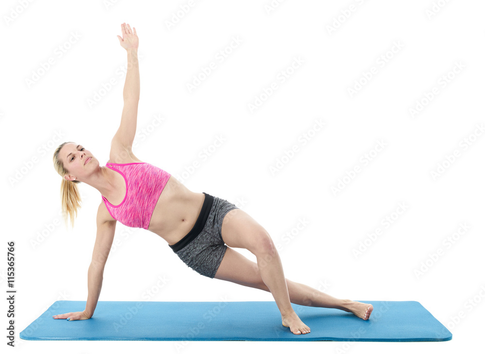 Woman doing stretching exercises.. Woman doing stretching exercises..