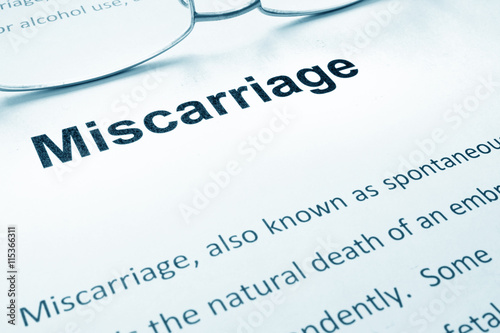Miscarriage sign on a paper and glasses.