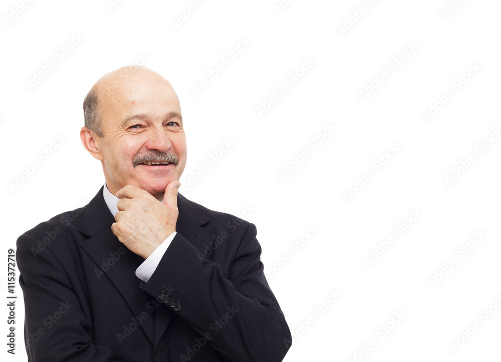 Elderly businessman smiling rubbing his chin Elderly businessman smiling rubbing his chin