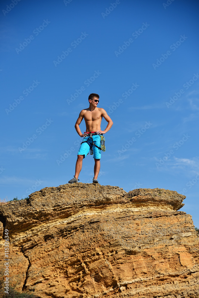 Extreme Climber On The Top Of Mountain