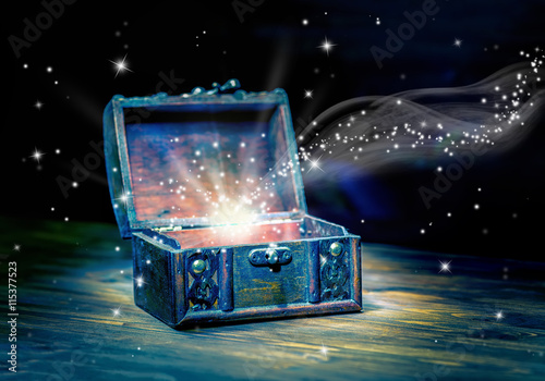 concept greeting card of opened chest treasure with mystical mir