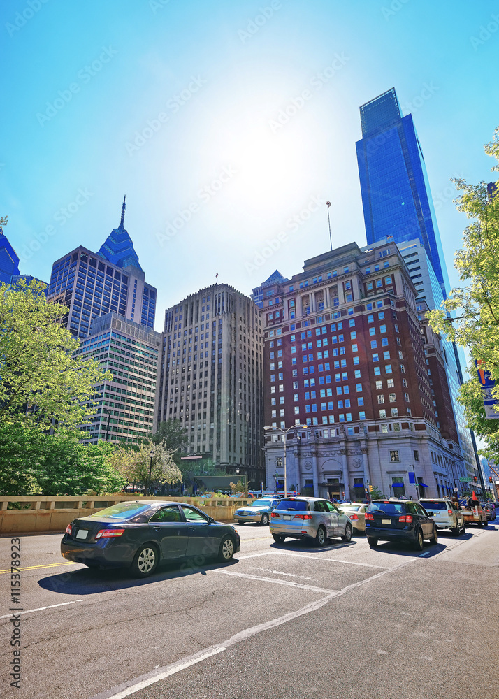 Road view on Penn Center with skyline of skyscrapers