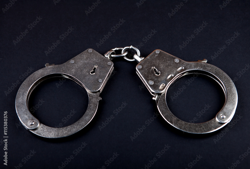 Handcuffs on the Black Handcuffs on the Black