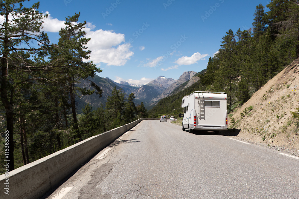 Auto-camper on the road in the French Alps 
