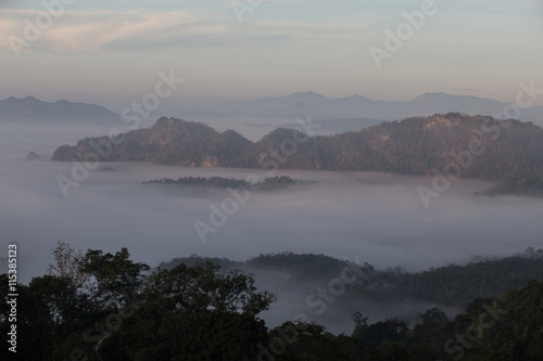 Fog mountain in the early morning sunrise © rufous