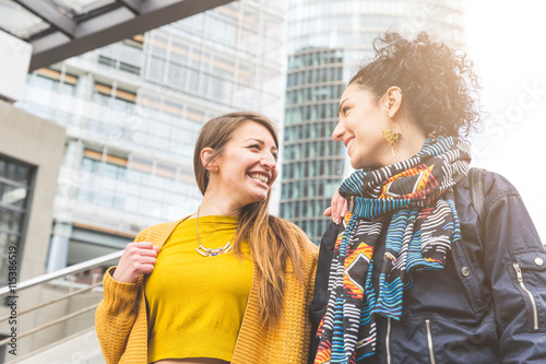 Canvas Print Lesbian couple walking in Potsdamer Platz, Berlin