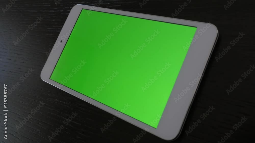 Greenscreen display tablet computer on table panning 4K 2160p 30fps UltraHD footage - Close-up of chroma key greenscreen tablet PC exposed slow pan 4K 3840X2160 UHD video Greenscreen display tablet computer on table panning 4K 2160p 30fps UltraHD footage - Close-up of chroma key greenscreen tablet PC exposed slow pan 4K 3840X2160 UHD video