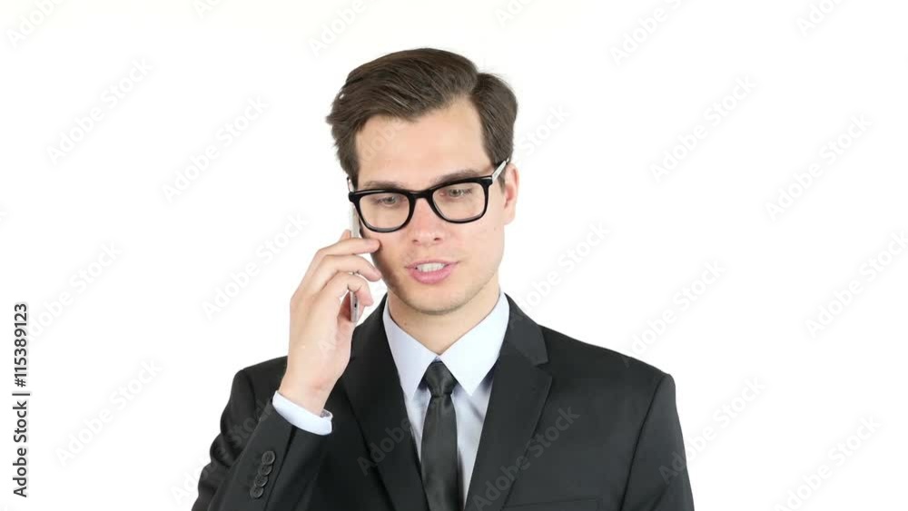 Portrait of confident handsome businessman speaking on smartphone Portrait of confident handsome businessman speaking on smartphone