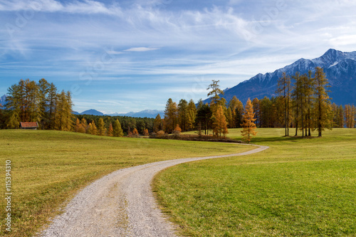 Autumn mountain scenery in the Alps with hiking trail. Mieminger plateau, Austria, Tyrol.