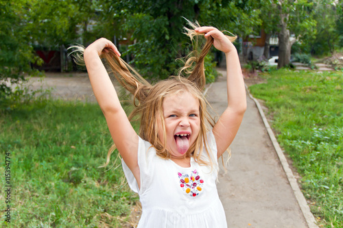 Girl makes faces imitate witch