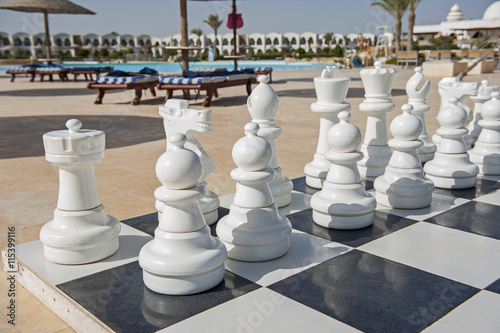Photography Giant chess board game in tropical resort