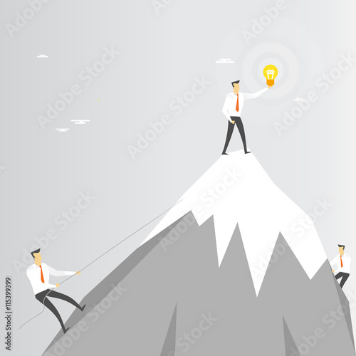 Businessman on mountain top, creativity triumphs