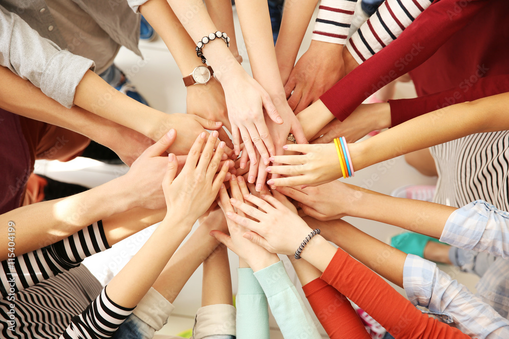 Fototapeta premium Group of people hands together