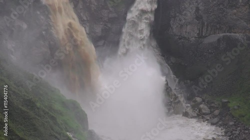 Experience the breathtaking beauty of the tropical winter slow motion waterfall endpoint in Baños de Agua Santa,Ecuador,a must visit destination for nature lovers. photo