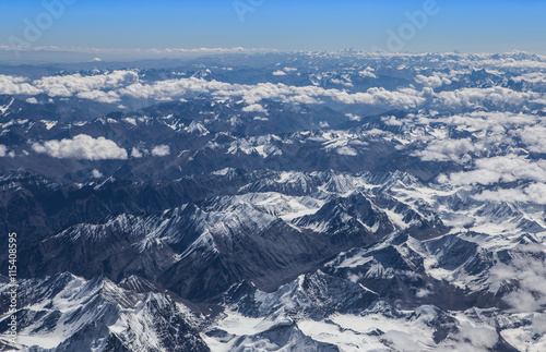 Himalaya mountains under clouds