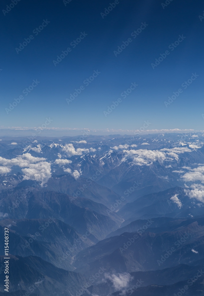 Naklejka premium Himalaya mountains under clouds