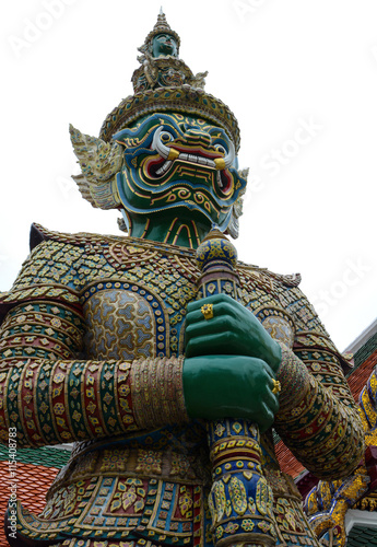 Giant yaksha demon guardian statue at the historic Grand Palace in Bangkok, Thailand