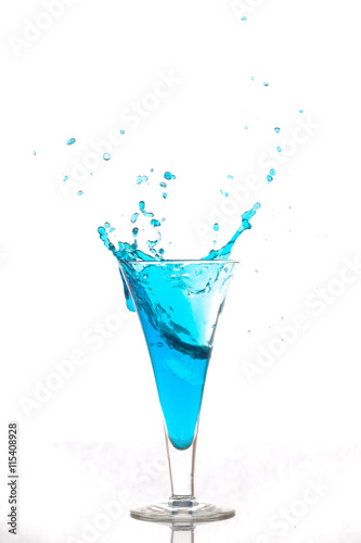 splashing water in glass © denboma