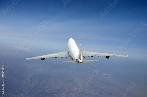 Heavy jet airplane in flight from above