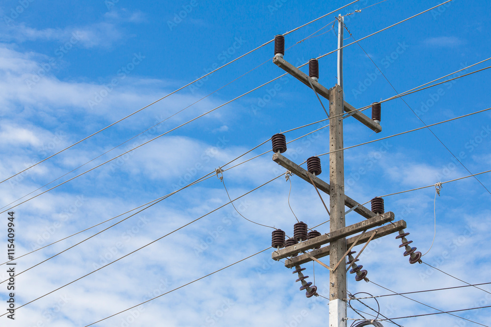 electricity post with clear blue sky and clouds electricity post with clear blue sky and clouds