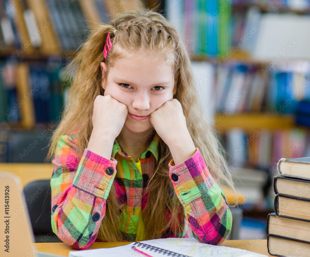 Sad girl in the library Sad girl in the library
