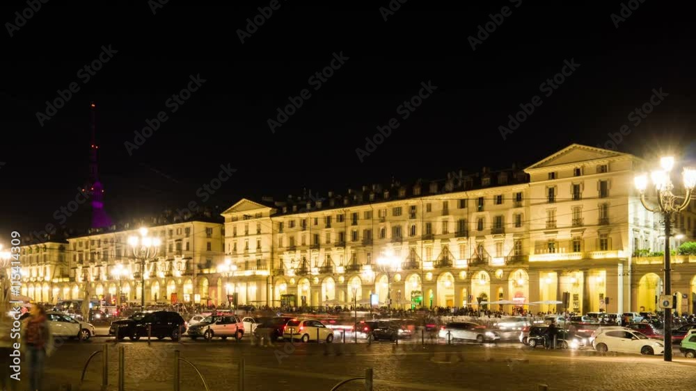people walking at night time lapse turin vittorio veneto square