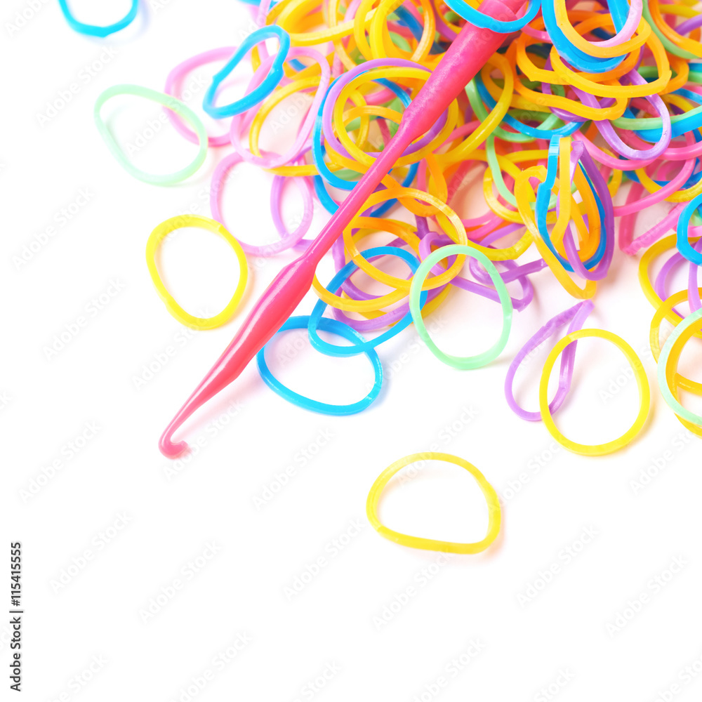 Fototapeta premium Pile of multiple loom bands isolated