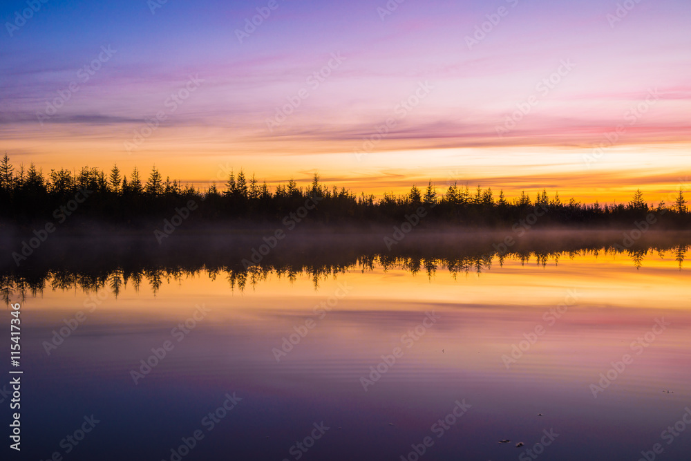 Fototapeta premium Summer landscape with river and sunset and cloudy sky