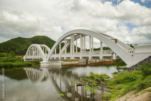 white railway bridge constructed on cloudy days at Lamphun, Thailand.